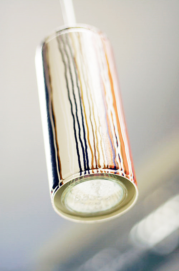 Unique suspended lights made from recycled spray cans.