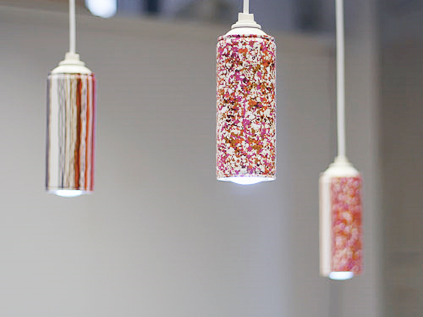 Unique suspended lights made from recycled spray cans.
