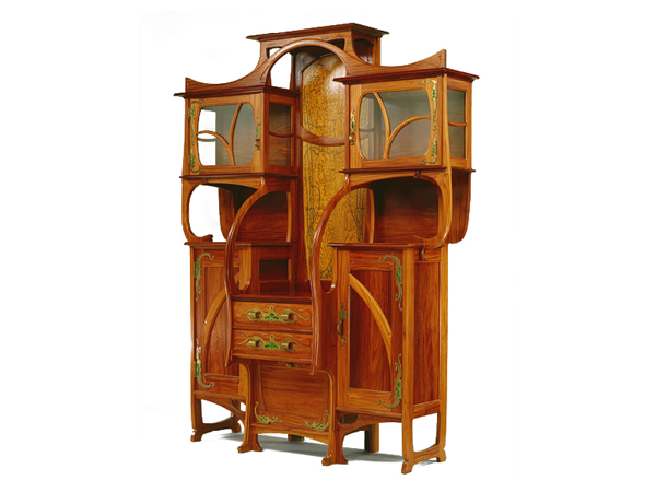 Cabinet-Vitrine, a carved narra wood cabient by Belgian Art Nouveau architect and furniture designer Gustave Serrurier-Bovy.
