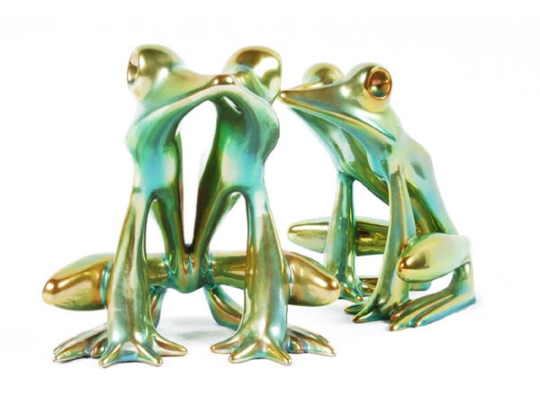 Iridescent colored porcelain frogs made by Hungarian Company Zsolnay.