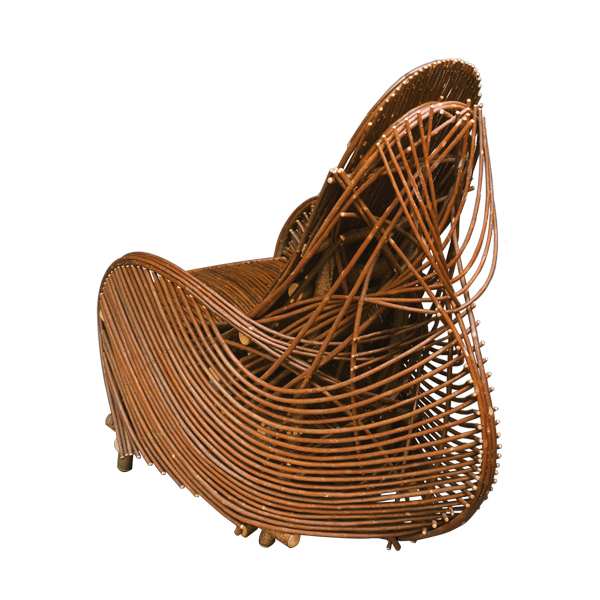 A rustic art nouveau style willow chair design and made by American furniture designer Clifton Monteith.