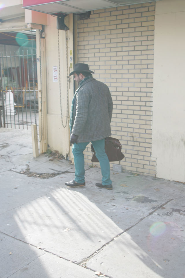 A Ralph Lauren plaid scarf with Cole Haan suede men's Merced Duffle bag and teal zara jeans.