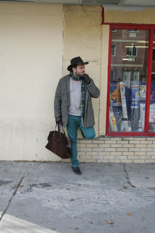 A Ralph Lauren plaid scarf with Cole Haan suede men's Merced Duffle bag and teal zara jeans.