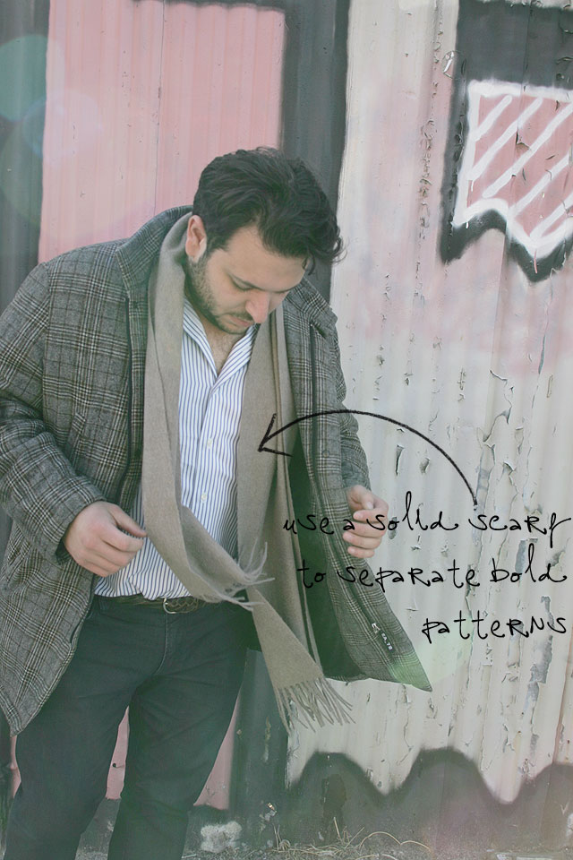 Wearing Gap jeans, a Joseph Abboud pinstripe shirt, a Tommy Bohama brown braided belt, and a Egon Furstonberg plaid coat.