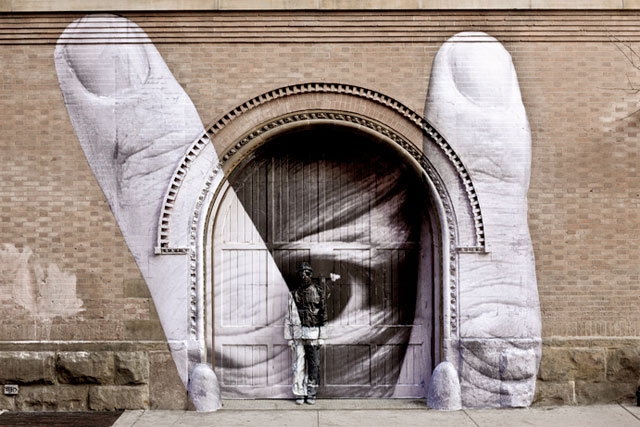 Wall mural art collaboration with French street artist JR and Chinese camouflage artist Liu Bolin.