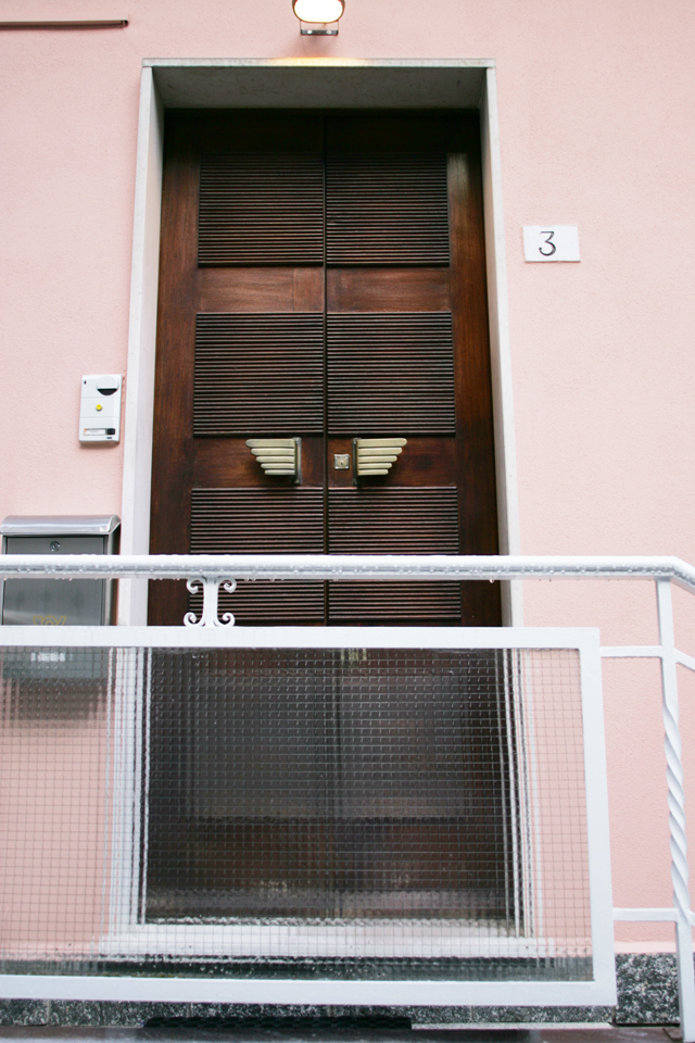 Italian modern art-deco style design carved wood door in Lake Como Italy.