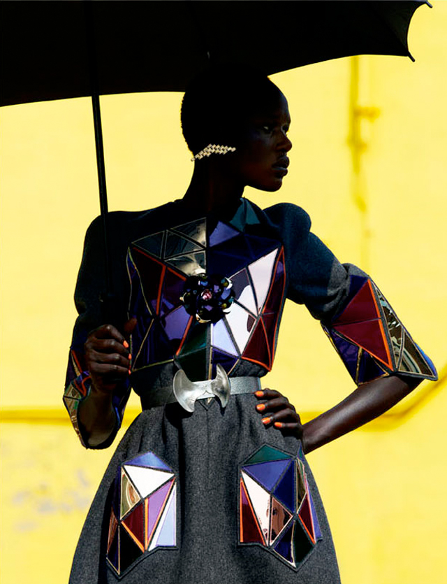 Fashion model Ajak Deng wearing Chanel, Balmain, Prada and Balenciaga with techno chic accessories.