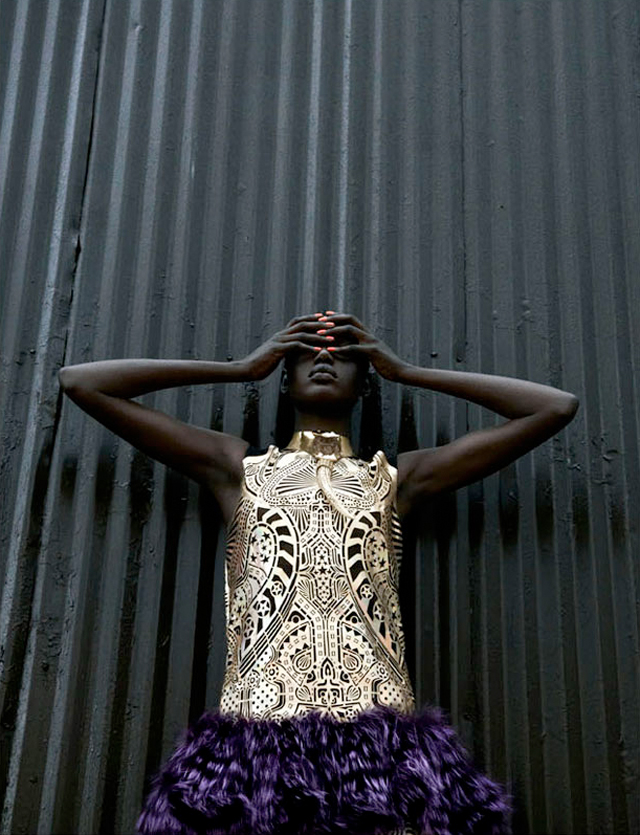 Fashion model Ajak Deng wearing Chanel, Balmain, Prada and Balenciaga with techno chic accessories.