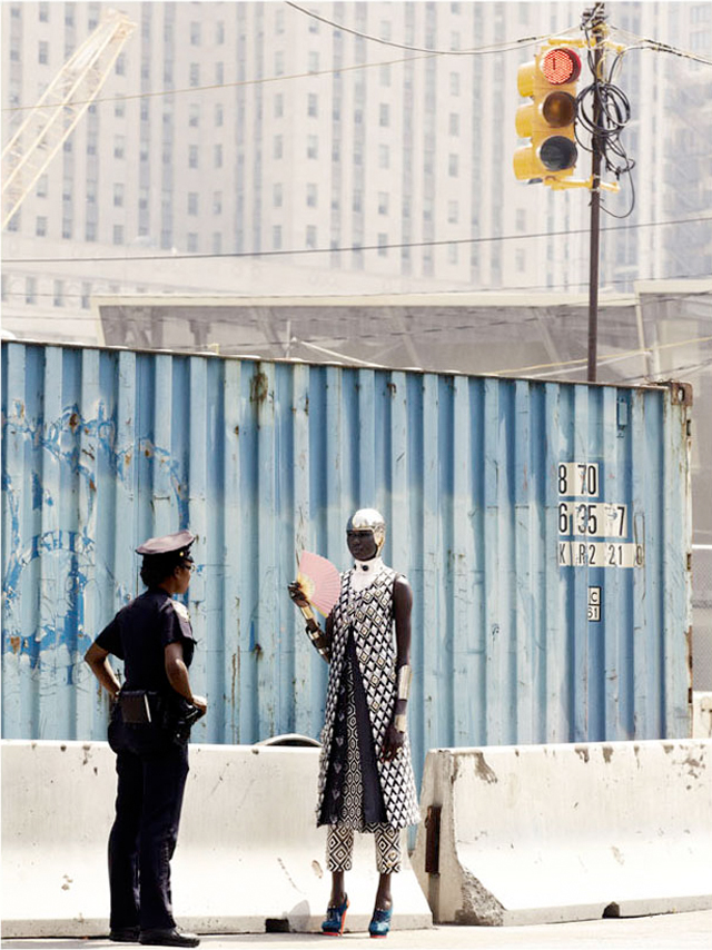 Fashion model Ajak Deng wearing Chanel, Balmain, Prada and Balenciaga with techno chic accessories.