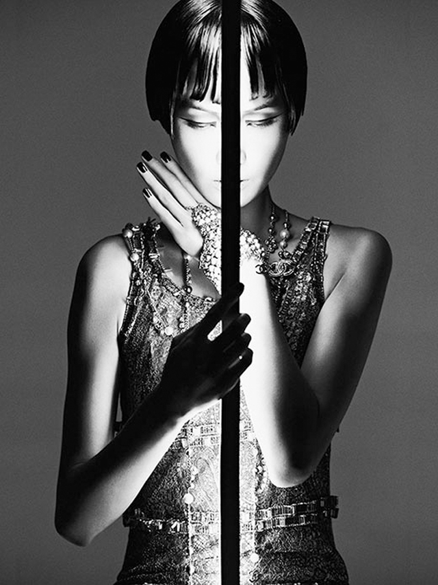 Charles Guo photographs model Wang Xiao wearing Tron inspired futuristic fashion.