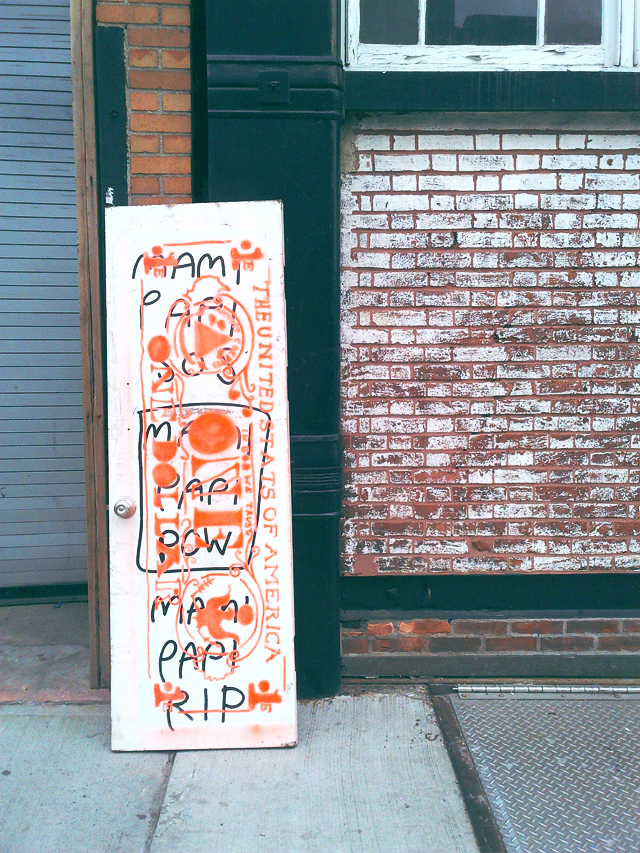 A graffiti covered door in Williamsburg, Brooklyn.