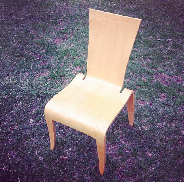 A vintage post modern form molded plywood chair.