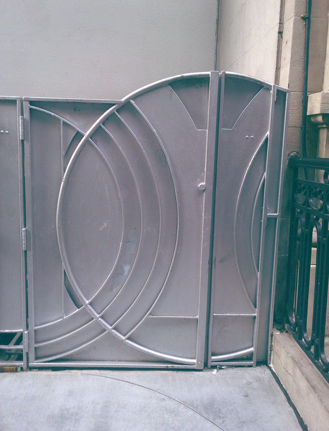Silver art deco style doors at the Guggenheim Museum in NYC.