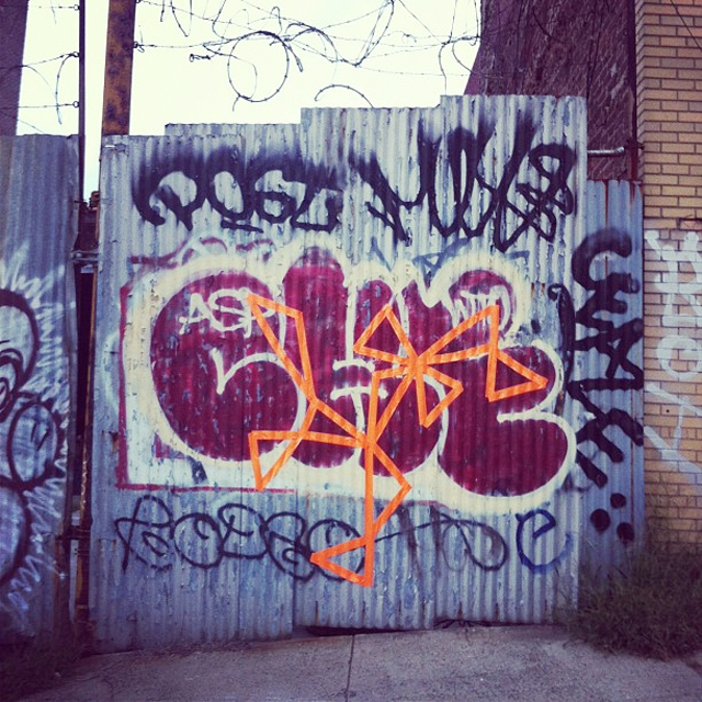 Taped DIY graffiti in williamsburg Brooklyn.