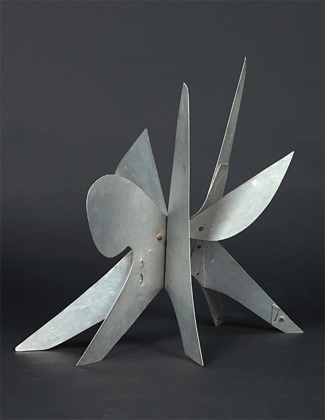 A mid-century sheet metal modern sculpture by American artist and Sculptor Alexander Calder.